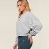 Worn Crest Graphic Sweatshirt