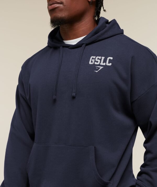 GFXStory3GoodLiftingPulloverSEPTGSHeavyBlueA5B8N_UCTN_0146_6e7aba5d-02c2-436c-803f-bef7a6a79210_1920x GYMSHARK FADED COLLEGIATE GRAPHIC HOODIE – HEAVY BLUE