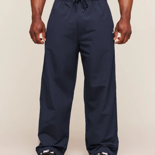 images-OversizedPolyTrackPantGSHeavyBlueGSTintedWhiteA5B1U_UD9M_4074_V1_1920x GYMSHARK RETRO COLLEGIATE TRACK PANTS – HEAVY BLUE / TINTED WHITE