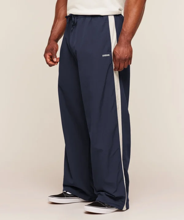 GYMSHARK RETRO COLLEGIATE TRACK PANTS – HEAVY BLUE / TINTED WHITE