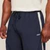 GYMSHARK RETRO COLLEGIATE TRACK PANTS – HEAVY BLUE / TINTED WHITE