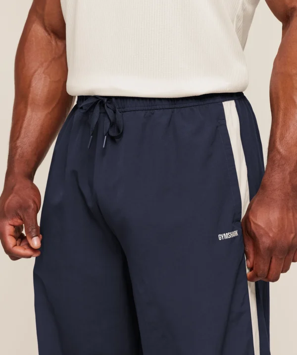 GYMSHARK RETRO COLLEGIATE TRACK PANTS – HEAVY BLUE / TINTED WHITE