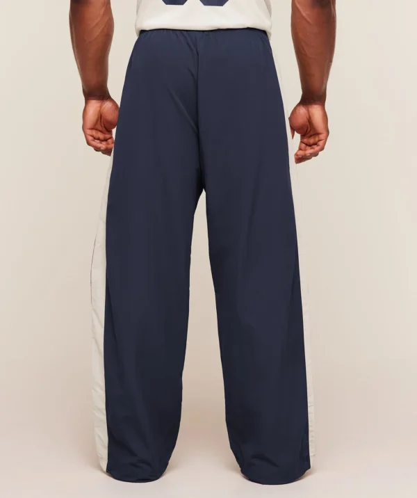 GYMSHARK RETRO COLLEGIATE TRACK PANTS – HEAVY BLUE / TINTED WHITE