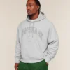 images-RestDayRetroCollegiatePulloverBROSSoftGreyMarlA4C3V_GC3C_0271_V2_1920x GYMSHARK RETRO COLLEGIATE GRAPHIC HOODIE – SOFT GREY MARL